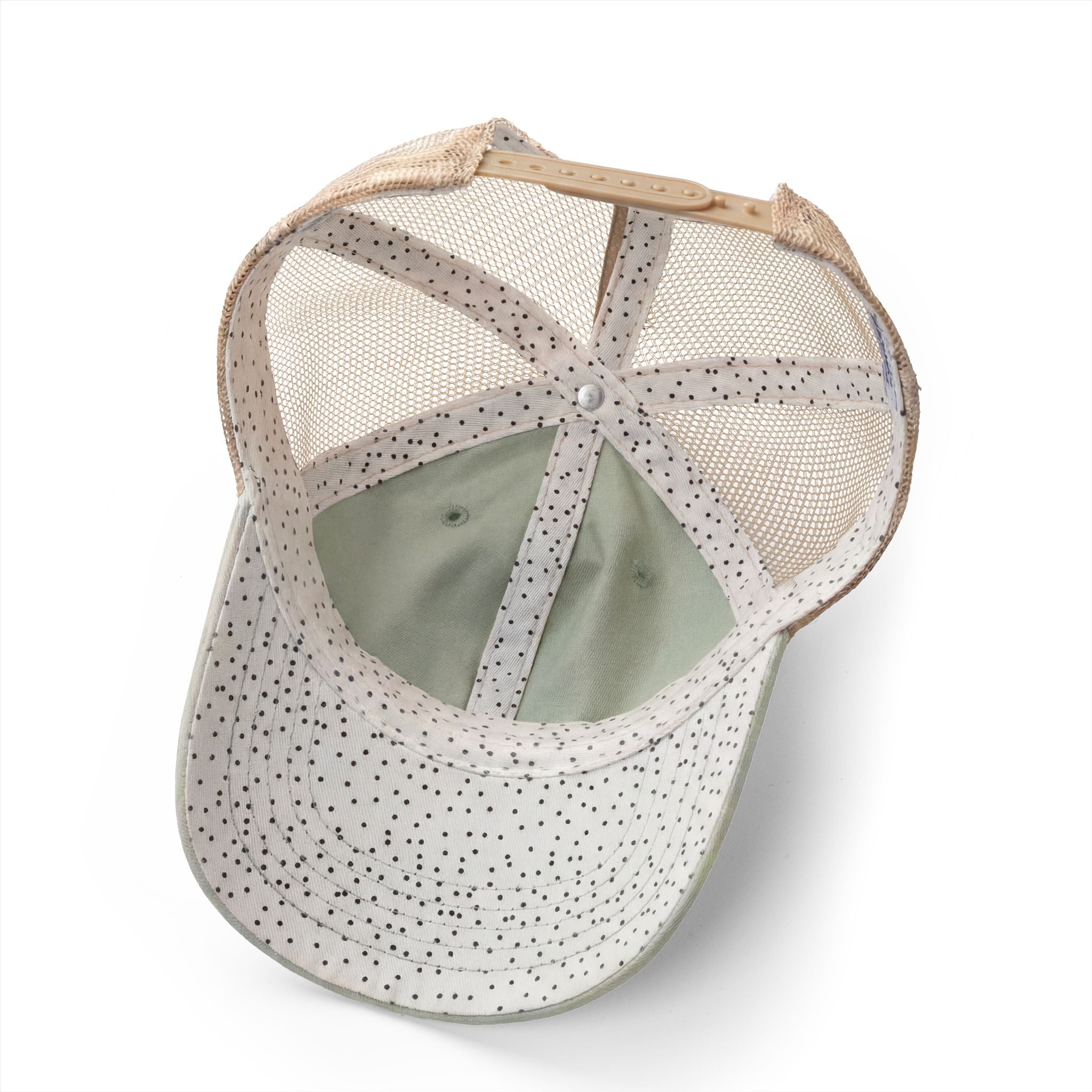 Washed mesh-back cap with speckled dots and sage green underbrim