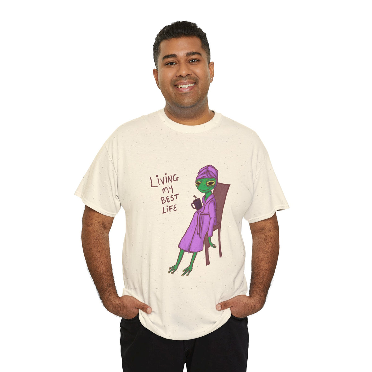 Cream graphic t-shirt on model featuring “Living my Best Life” character art