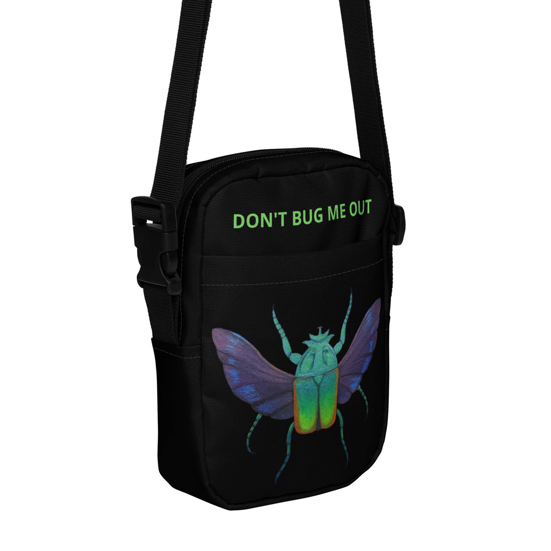 Black utility crossbody bag with green slogan and colorful insect graphic on front
