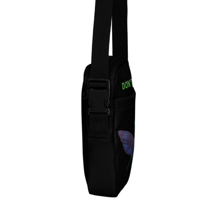 Black utility crossbody bag, adjustable strap, front pocket and logo patch