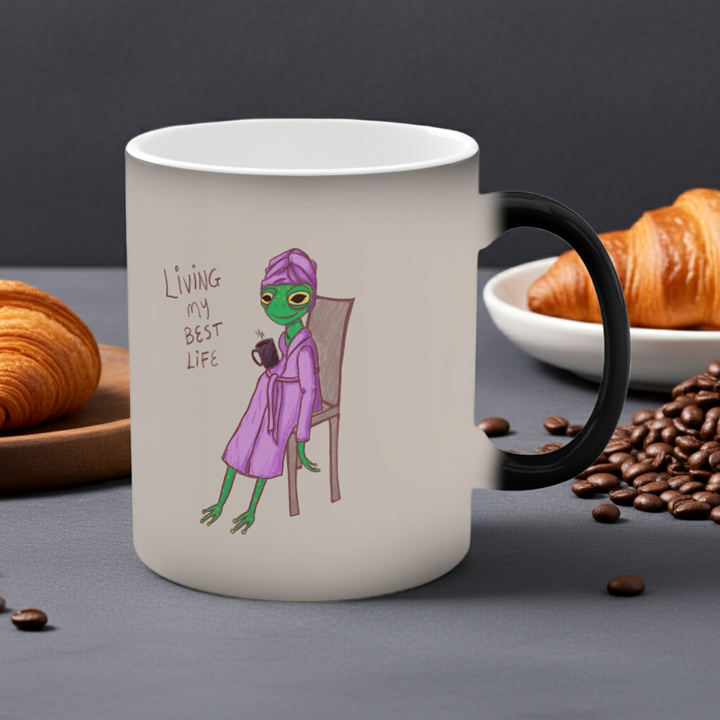 Side-view white mug with black handle, purple frog graphic and &