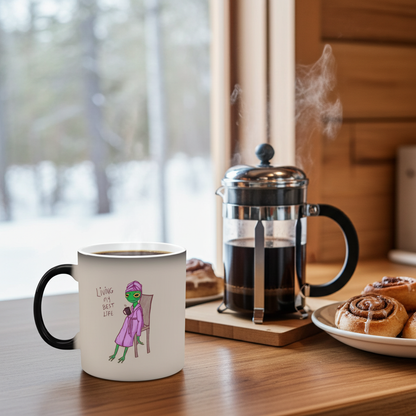 White mug with black handle and purple frog graphic, &